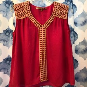 Collective Concepts hot pink sleeveless shirt with cream macrame detail